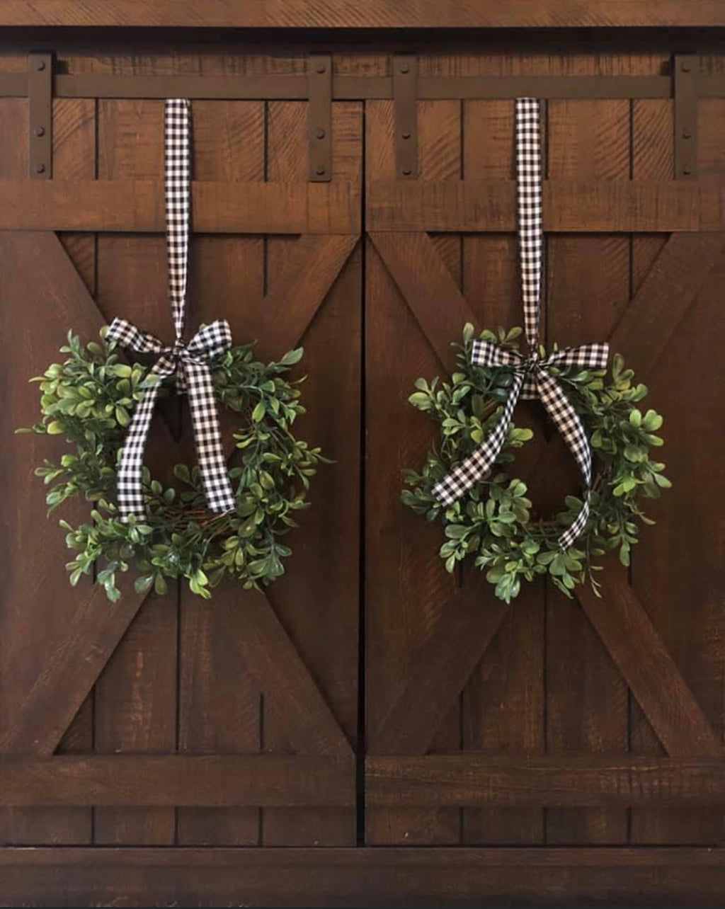 Small farmhouse nine inch boxwood wreaths w/ buffalo plaid ribbon, hang from cabinets, chairs, shutters